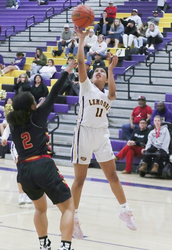 Tigers' hoop teams win big in West Yosemite League action and prepare for Mission Oak coming up next Lemoore's Layla Ayala looks to score against Tulare Union Thursday night in Lemoore.